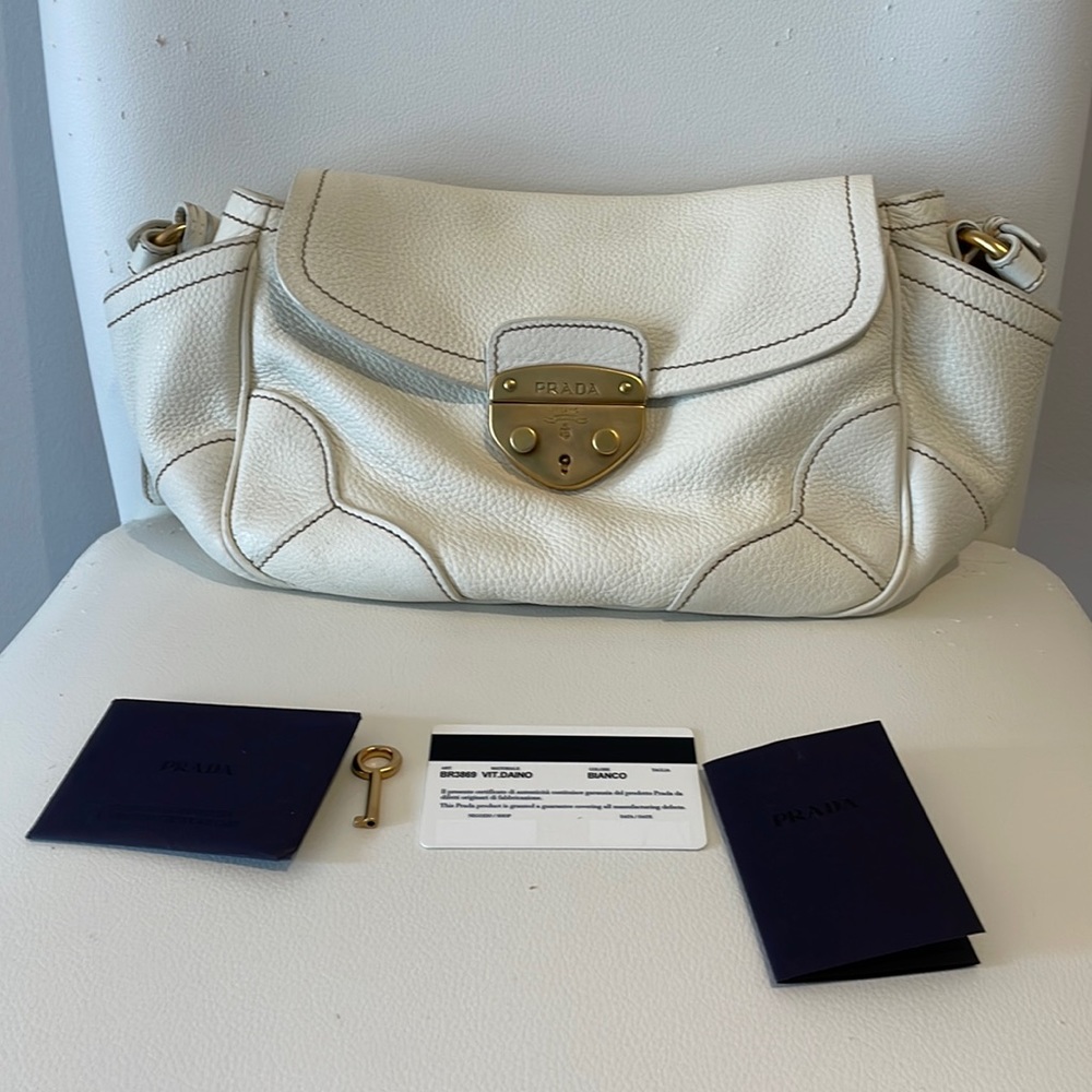 Pre loved leather Prada bag. Comes with lock and key. Authentication provided